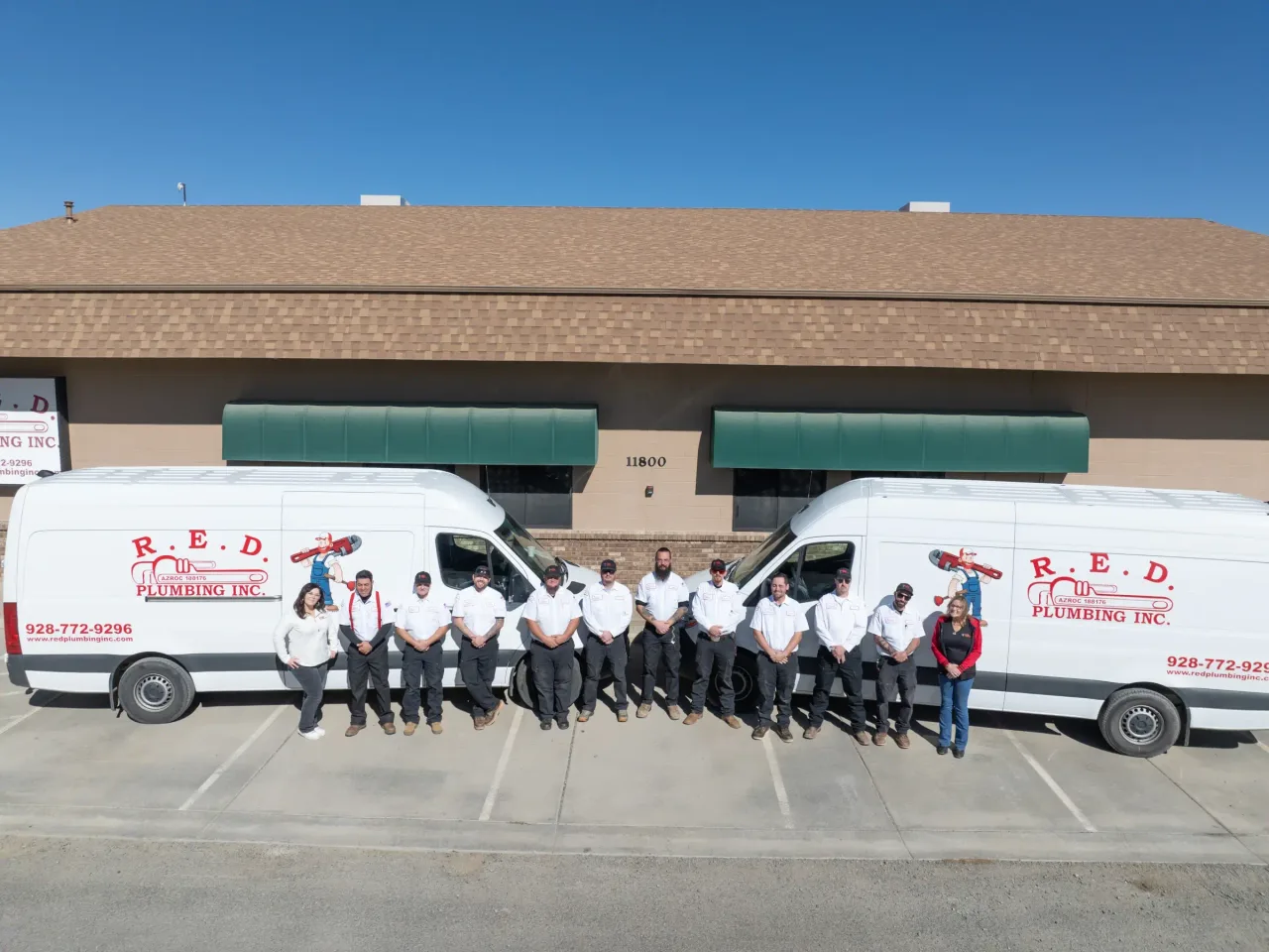 red plumbing team vans